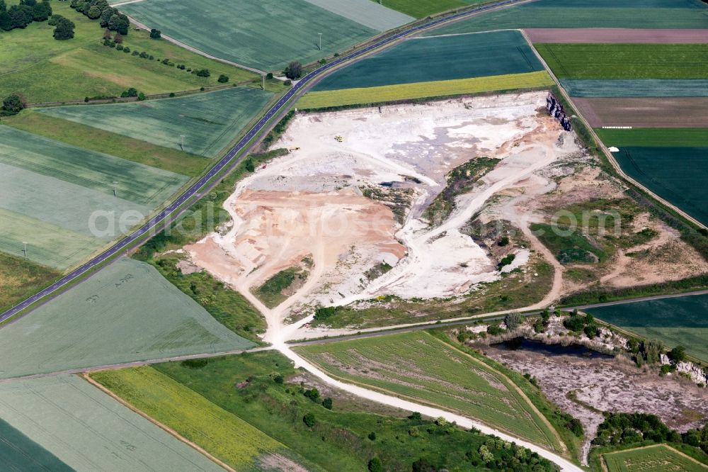 Aerial photograph Sulzheim - Site and tailings area of the gravel mining of Concrete-manufacturer in Sulzheim in the state Bavaria, Germany