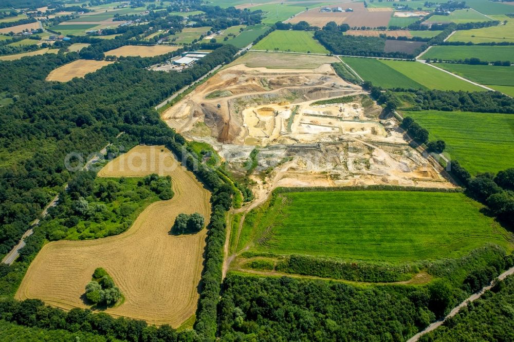 Bottrop from above - Site and tailings area of the gravel mining Dinslakener Strasse destrict Kirchhellen in Bottrop in the state North Rhine-Westphalia