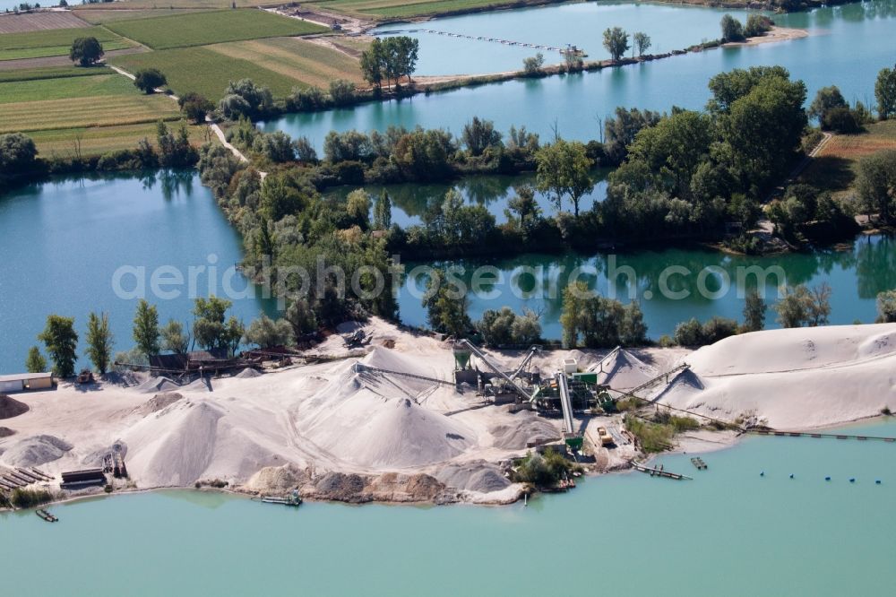 Aerial photograph Leimersheim - Site and tailings area of the gravel mining Kieswerk Wolf - Markus Wolf Kieswerk und Transporte Am Wolfsberg in the district Hardtwald in Leimersheim in the state Rhineland-Palatinate