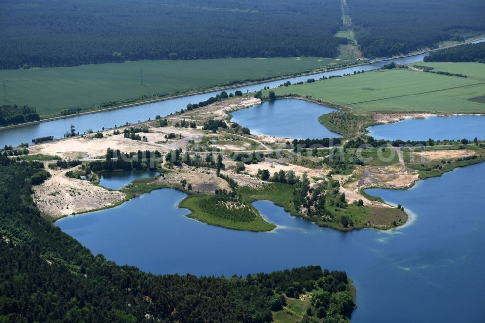 Burg from the bird's eye view: Site and tailings area of the gravel mining of gravel quarry Niegripp between the Elbe-Havel channel and the Mittel lake in Burg in the state Saxony-Anhalt