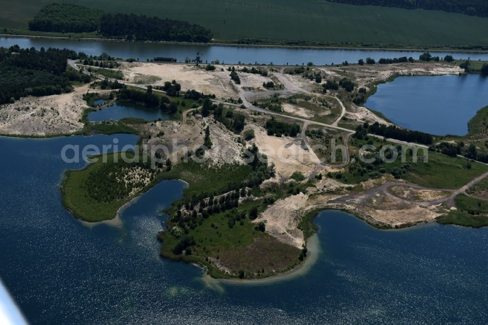 Aerial photograph Burg - Site and tailings area of the gravel mining of gravel quarry Niegripp between the Elbe-Havel channel and the Mittel lake in Burg in the state Saxony-Anhalt