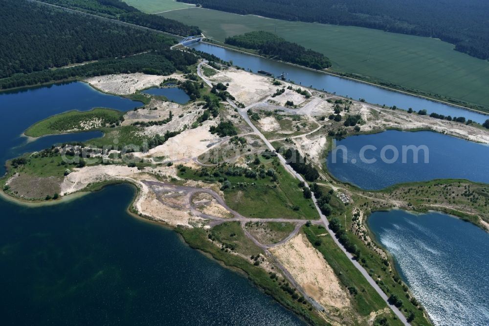 Aerial image Burg - Site and tailings area of the gravel mining of gravel quarry Niegripp between the Elbe-Havel channel and the Mittel lake in Burg in the state Saxony-Anhalt