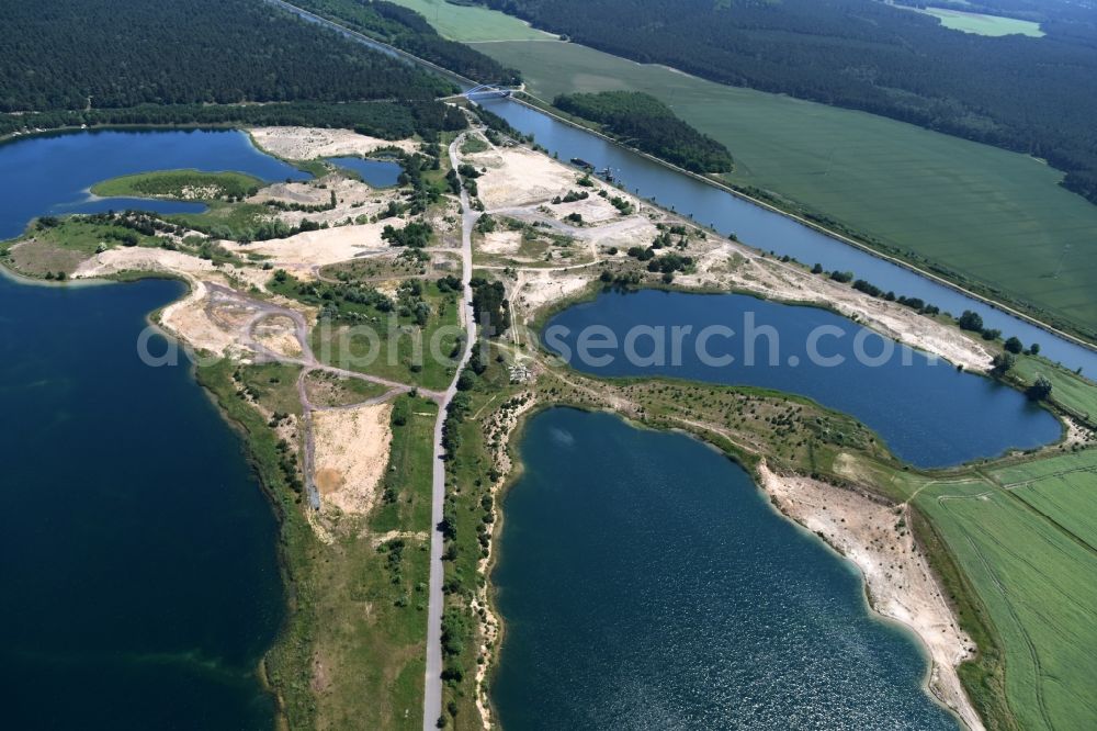 Aerial photograph Burg - Site and tailings area of the gravel mining of gravel quarry Niegripp between the Elbe-Havel channel and the Mittel lake in Burg in the state Saxony-Anhalt