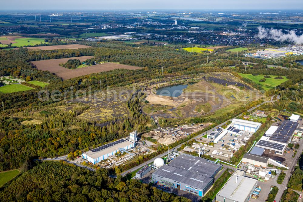 Kamp-Lintfort from above - Site and tailings area of the gravel mining of Koelbl GmbH & Co. KG in Kamp-Lintfort at Ruhrgebiet in the state North Rhine-Westphalia, Germany