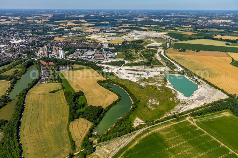 Beckum from above - Site and tailings area of the gravel mining Am Kollenbach in Beckum in the state North Rhine-Westphalia, Germany