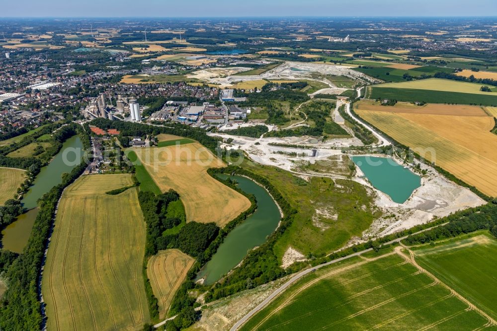 Beckum from the bird's eye view: Site and tailings area of the gravel mining Am Kollenbach in Beckum in the state North Rhine-Westphalia, Germany