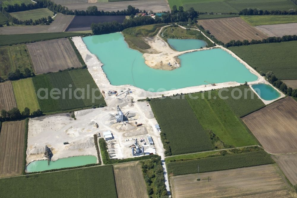 Neuching from above - Site and tailings area of the gravel mining in Neuching in the state Bavaria, Germany