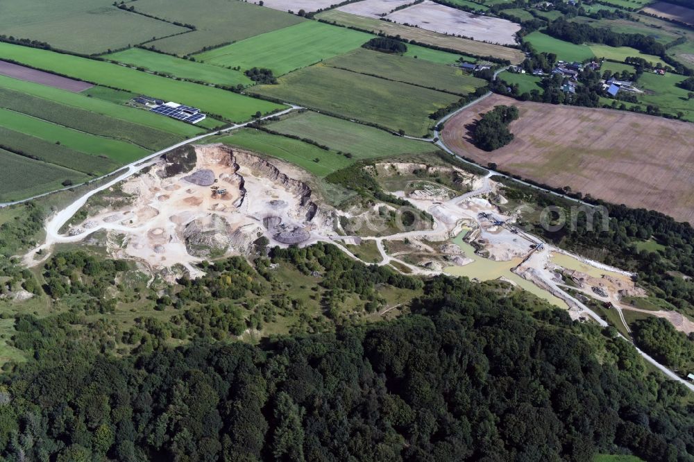 Oeversee from the bird's eye view: Site and tailings area of the gravel mining of the Gonde Clausen Kies- und Betonwerk Oeversee GmbH in Oeversee in the state Schleswig-Holstein