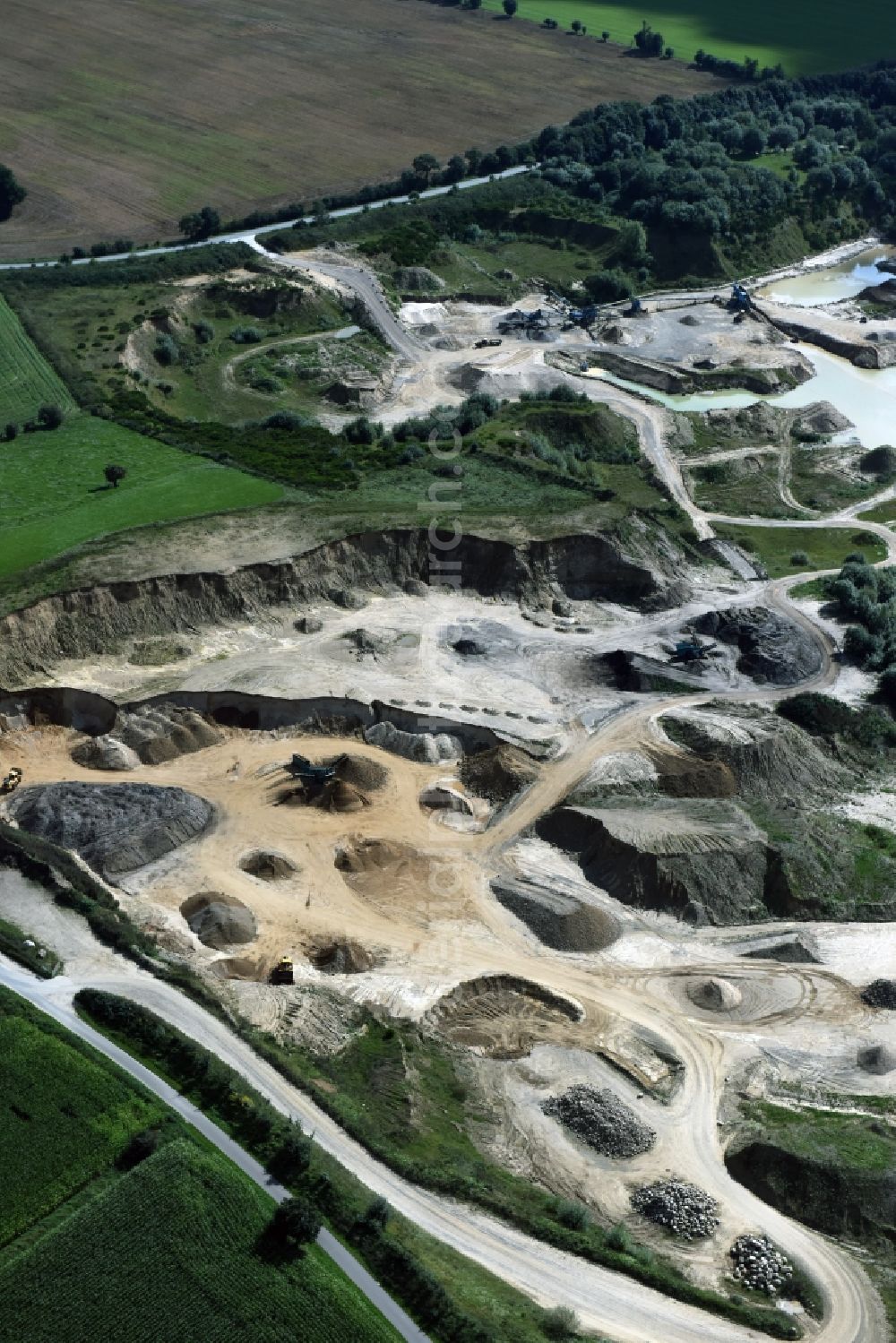 Oeversee from above - Site and tailings area of the gravel mining of the Gonde Clausen Kies- und Betonwerk Oeversee GmbH in Oeversee in the state Schleswig-Holstein