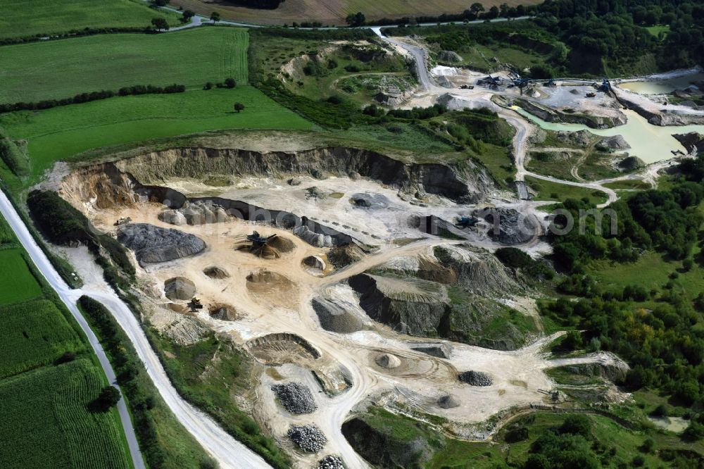 Oeversee from the bird's eye view: Site and tailings area of the gravel mining of the Gonde Clausen Kies- und Betonwerk Oeversee GmbH in Oeversee in the state Schleswig-Holstein