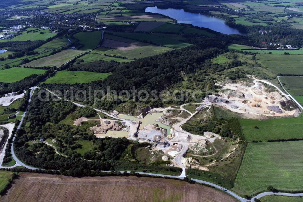 Oeversee from above - Site and tailings area of the gravel mining of the Gonde Clausen Kies- und Betonwerk Oeversee GmbH in Oeversee in the state Schleswig-Holstein