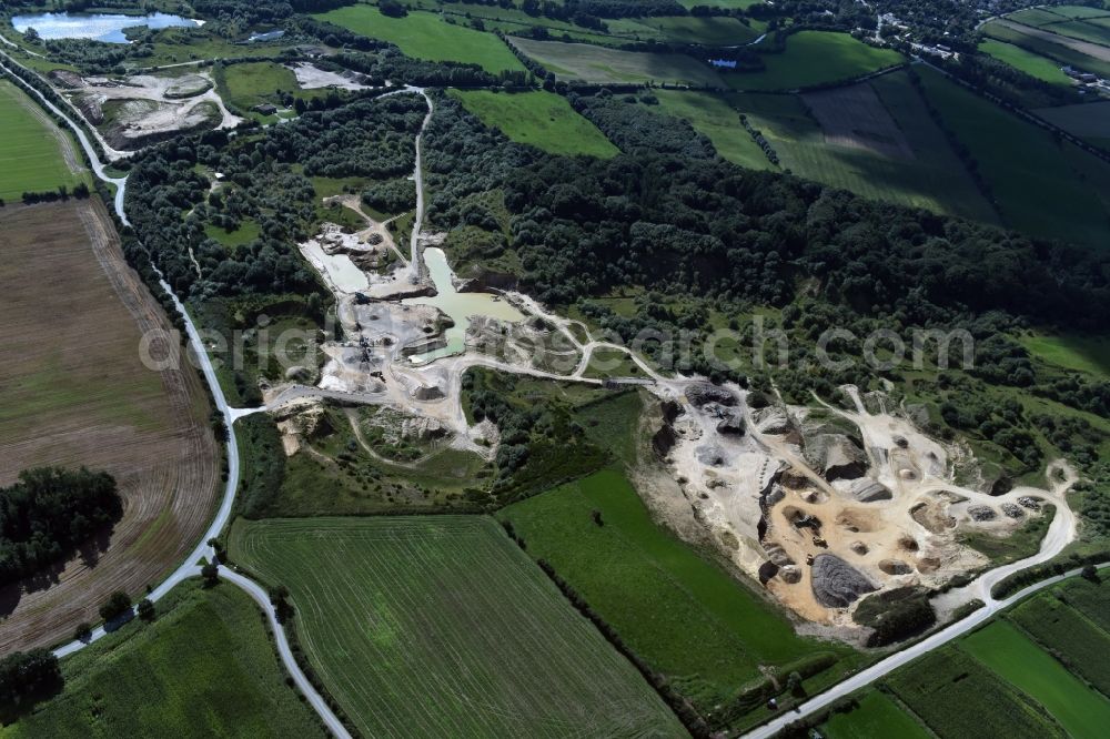 Oeversee from the bird's eye view: Site and tailings area of the gravel mining of the Gonde Clausen Kies- und Betonwerk Oeversee GmbH in Oeversee in the state Schleswig-Holstein