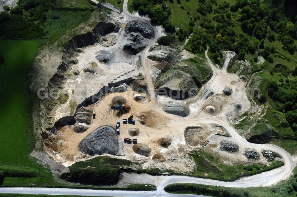 Oeversee from the bird's eye view: Site and tailings area of the gravel mining of the Gonde Clausen Kies- und Betonwerk Oeversee GmbH in Oeversee in the state Schleswig-Holstein