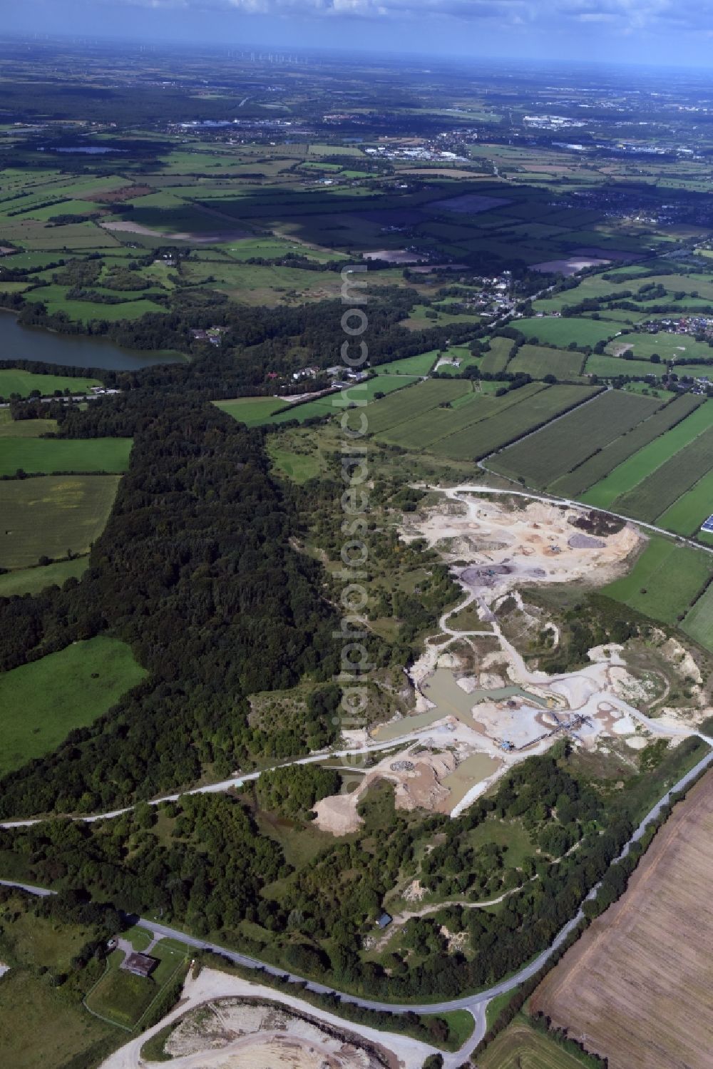 Oeversee from above - Site and tailings area of the gravel mining of the Gonde Clausen Kies- und Betonwerk Oeversee GmbH in Oeversee in the state Schleswig-Holstein