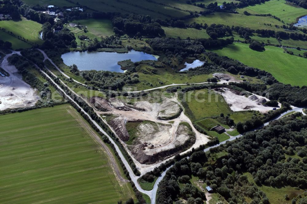 Aerial image Oeversee - Site and tailings area of the gravel mining of the Gonde Clausen Kies- und Betonwerk Oeversee GmbH in Oeversee in the state Schleswig-Holstein