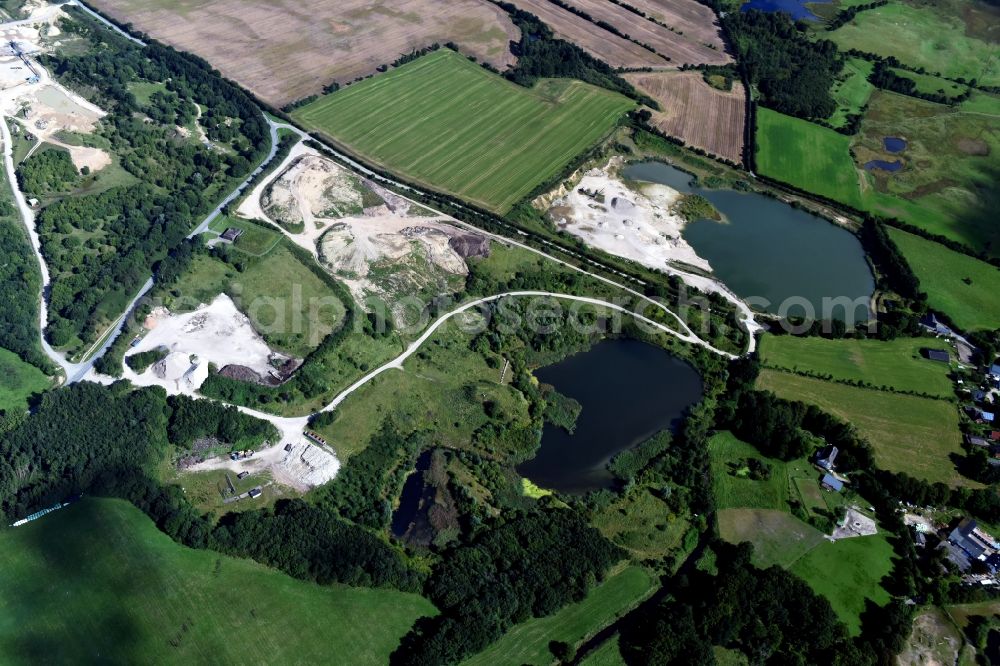 Oeversee from the bird's eye view: Site and tailings area of the gravel mining of the Gonde Clausen Kies- und Betonwerk Oeversee GmbH in Oeversee in the state Schleswig-Holstein