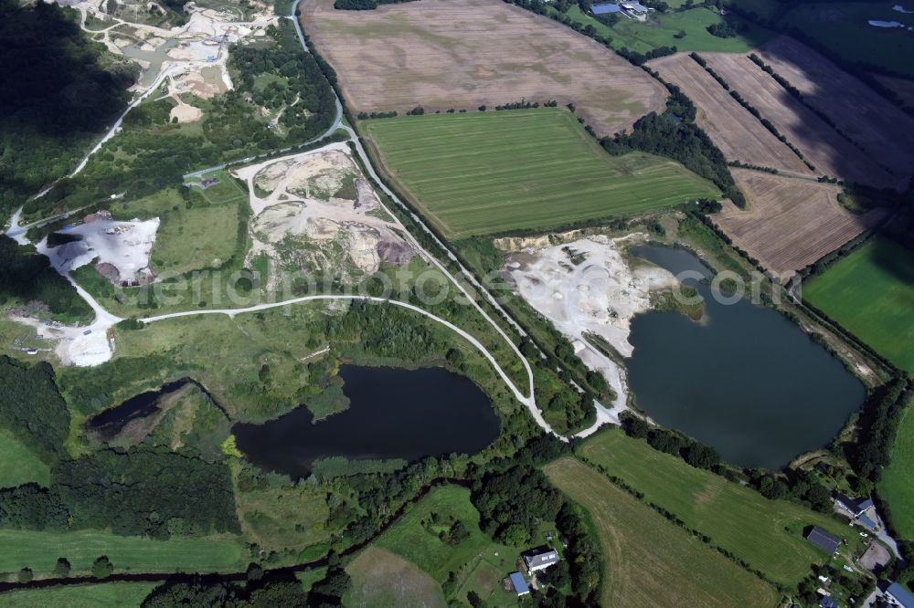 Oeversee from the bird's eye view: Site and tailings area of the gravel mining of the Gonde Clausen Kies- und Betonwerk Oeversee GmbH in Oeversee in the state Schleswig-Holstein