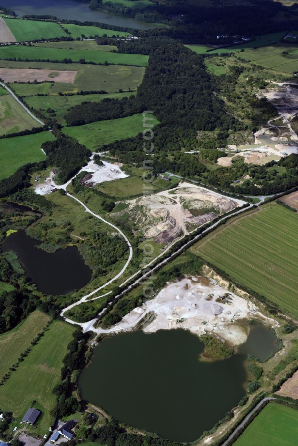 Aerial photograph Oeversee - Site and tailings area of the gravel mining of the Gonde Clausen Kies- und Betonwerk Oeversee GmbH in Oeversee in the state Schleswig-Holstein