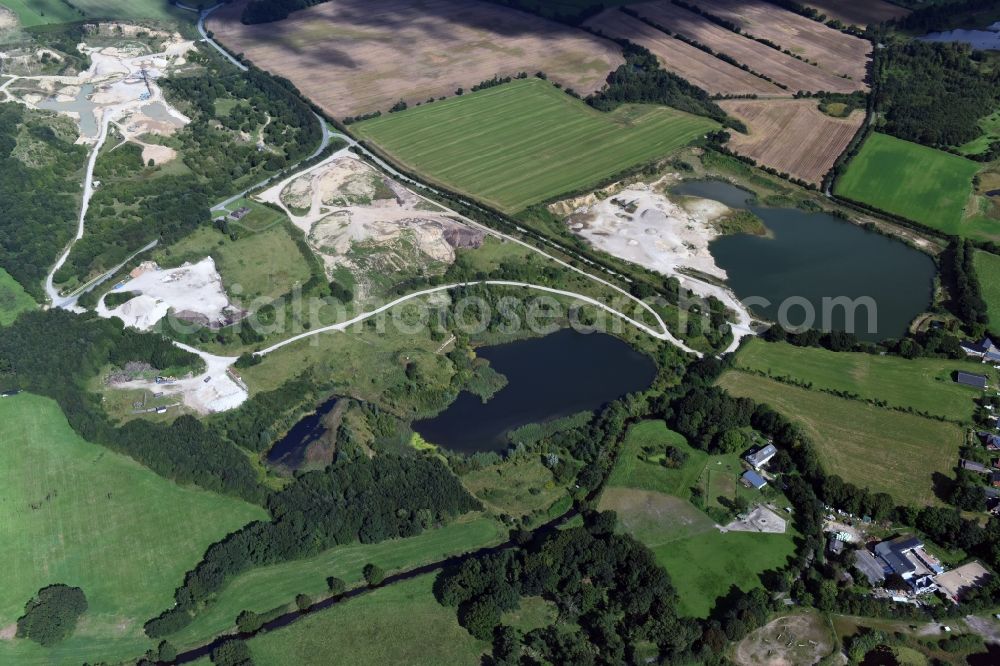 Oeversee from above - Site and tailings area of the gravel mining of the Gonde Clausen Kies- und Betonwerk Oeversee GmbH in Oeversee in the state Schleswig-Holstein