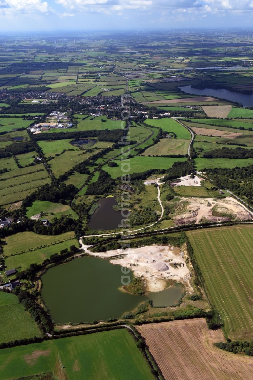 Aerial image Oeversee - Site and tailings area of the gravel mining of the Gonde Clausen Kies- und Betonwerk Oeversee GmbH in Oeversee in the state Schleswig-Holstein