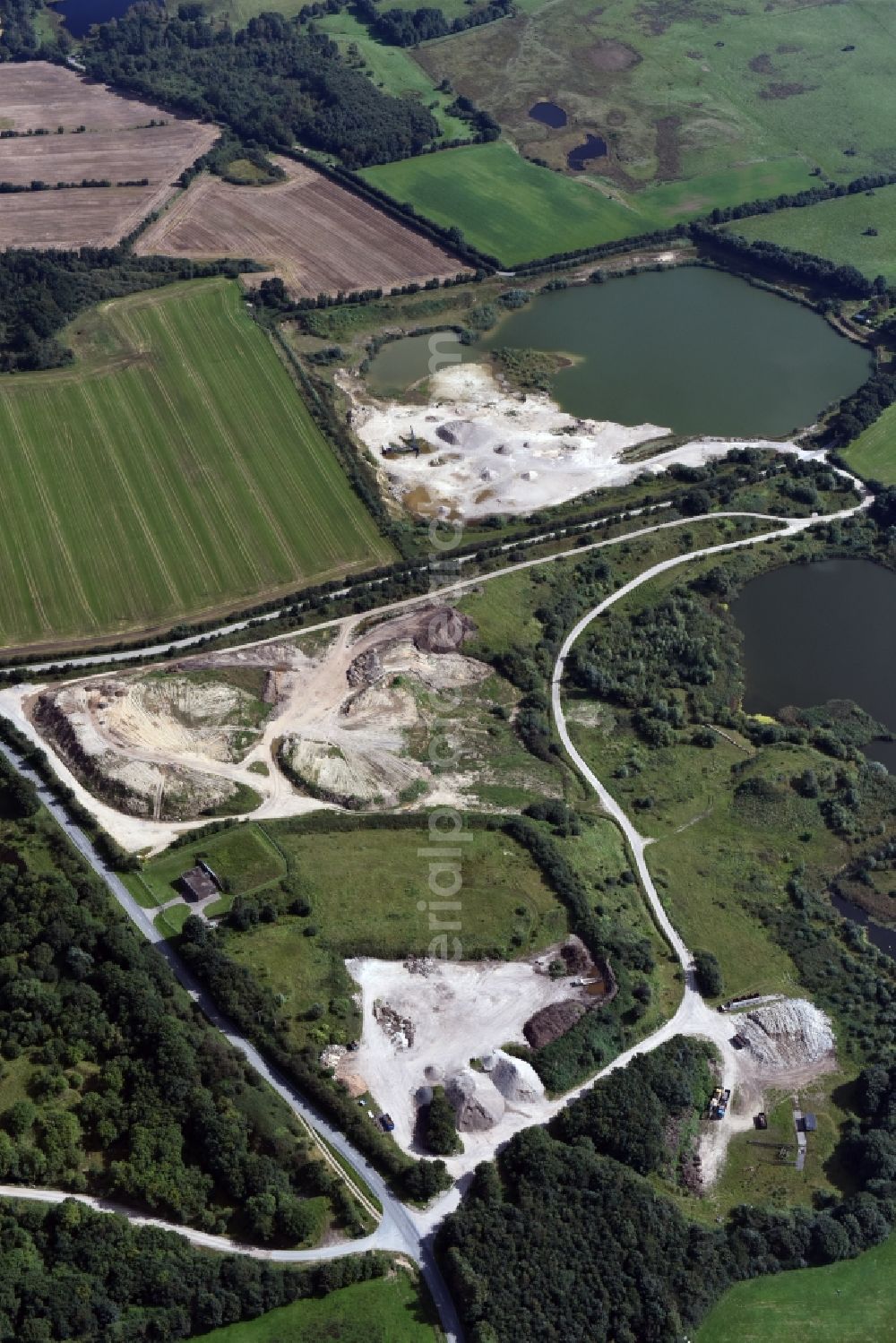 Aerial photograph Oeversee - Site and tailings area of the gravel mining of the Gonde Clausen Kies- und Betonwerk Oeversee GmbH in Oeversee in the state Schleswig-Holstein