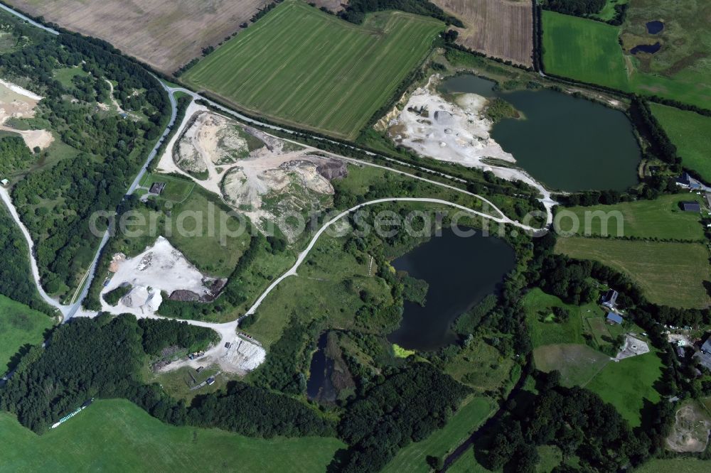 Oeversee from the bird's eye view: Site and tailings area of the gravel mining of the Gonde Clausen Kies- und Betonwerk Oeversee GmbH in Oeversee in the state Schleswig-Holstein