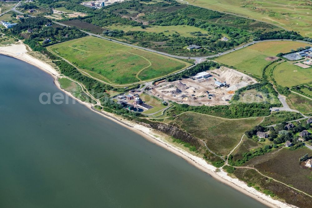 Aerial photograph Wenningstedt-Braderup (Sylt) - Site and tailings area of the gravel mining Peter Jacobsen Strassen- and Tiefbau GmbH & Co. KG in Wenningstedt-Braderup (Sylt) on the island of Sylt in the state Schleswig-Holstein, Germany