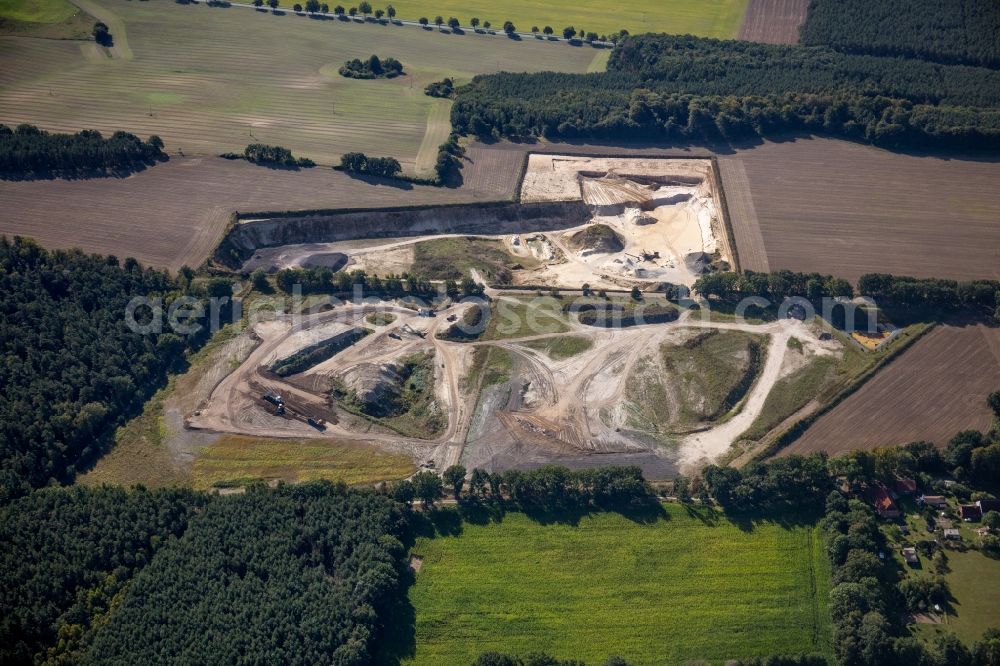 Dersenow from above - Site and tailings area of the gravel mining RBS-Kieshandelsgesellschaft mbH on Sonnenberg in Dersenow in the state Mecklenburg - Western Pomerania, Germany