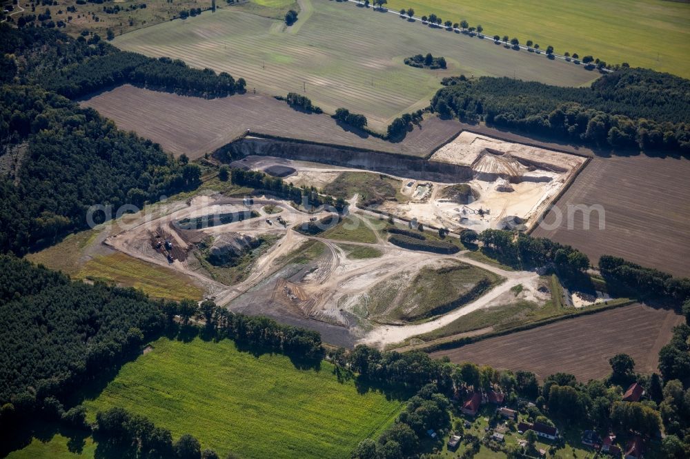 Dersenow from above - Site and tailings area of the gravel mining RBS-Kieshandelsgesellschaft mbH on Sonnenberg in Dersenow in the state Mecklenburg - Western Pomerania, Germany