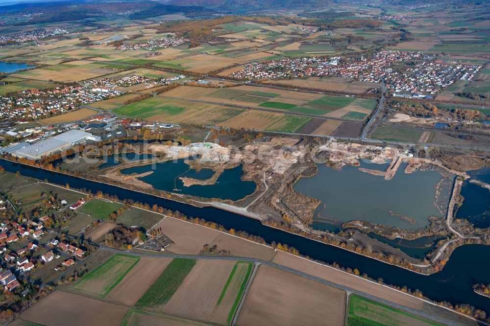 Eggolsheim from the bird's eye view: Site and tailings area of the gravel mining of A. Roth Sand- and Kieswerk GmbH in Eggolsheim in the state Bavaria, Germany