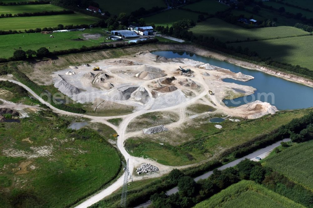 Oeversee from above - Site and tailings area of the gravel mining of the Gonde Clausen Kies- und Betonwerk Oeversee GmbH at the Sankelmarker lake in Oeversee in the state Schleswig-Holstein