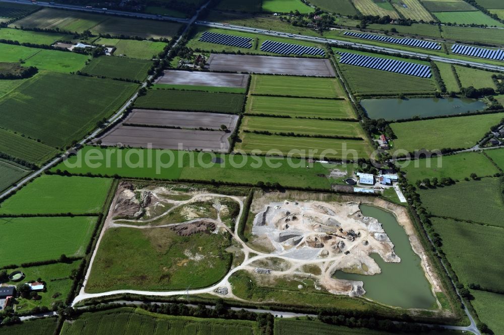 Aerial image Oeversee - Site and tailings area of the gravel mining of the Gonde Clausen Kies- und Betonwerk Oeversee GmbH at the Sankelmarker lake in Oeversee in the state Schleswig-Holstein