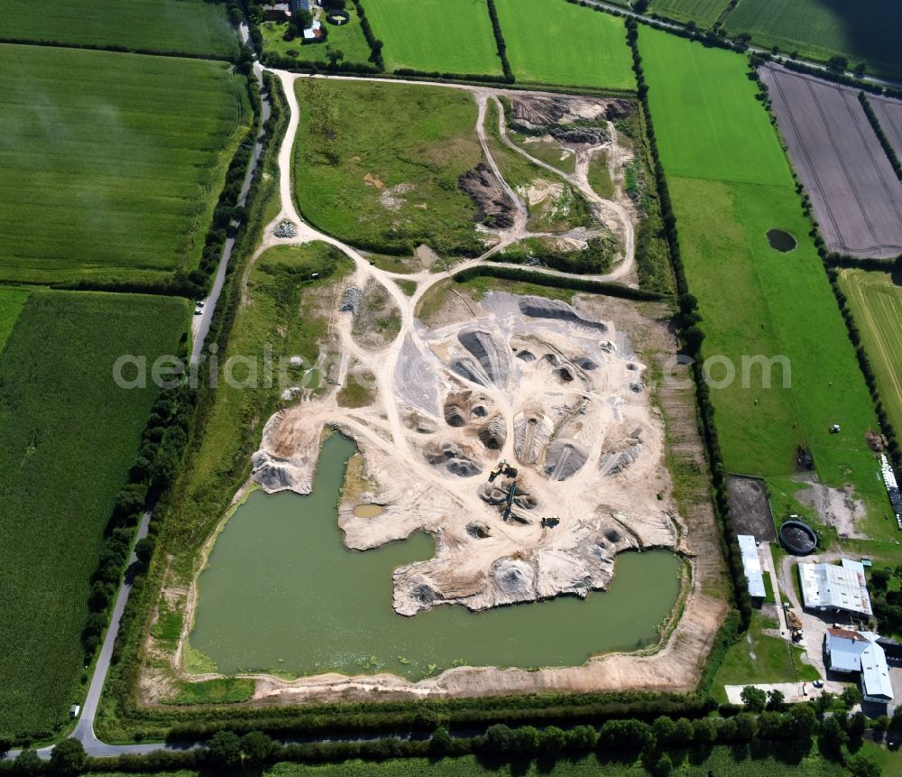 Aerial photograph Oeversee - Site and tailings area of the gravel mining of the Gonde Clausen Kies- und Betonwerk Oeversee GmbH at the Sankelmarker lake in Oeversee in the state Schleswig-Holstein