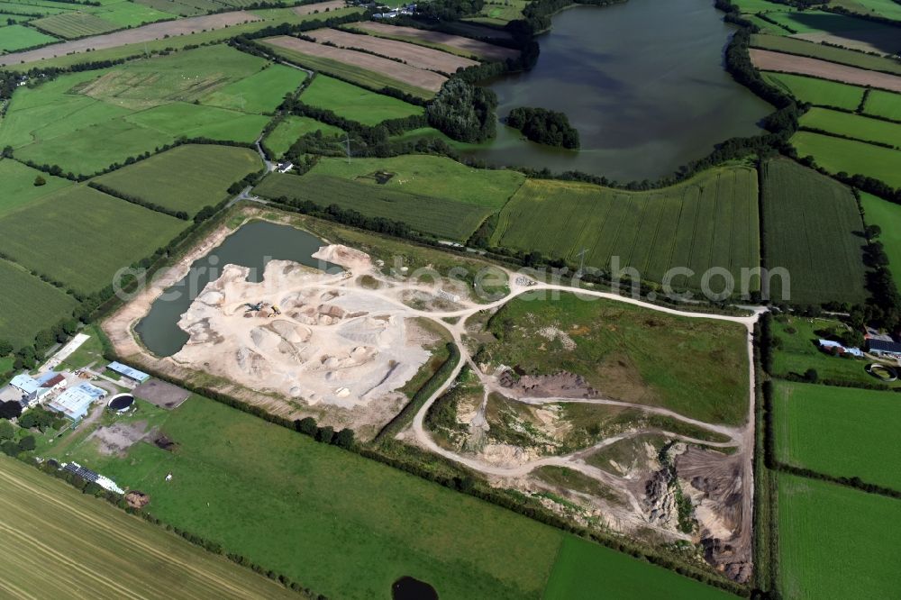 Aerial image Oeversee - Site and tailings area of the gravel mining of the Gonde Clausen Kies- und Betonwerk Oeversee GmbH at the Sankelmarker lake in Oeversee in the state Schleswig-Holstein