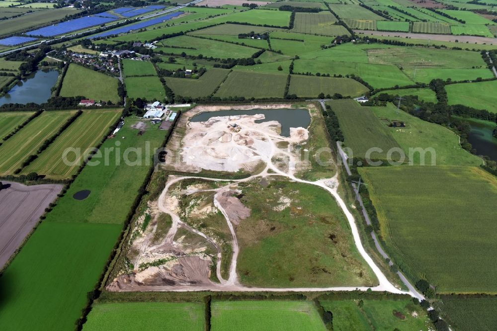 Oeversee from above - Site and tailings area of the gravel mining of the Gonde Clausen Kies- und Betonwerk Oeversee GmbH at the Sankelmarker lake in Oeversee in the state Schleswig-Holstein