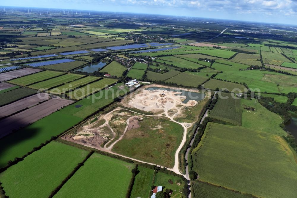 Aerial image Oeversee - Site and tailings area of the gravel mining of the Gonde Clausen Kies- und Betonwerk Oeversee GmbH at the Sankelmarker lake in Oeversee in the state Schleswig-Holstein