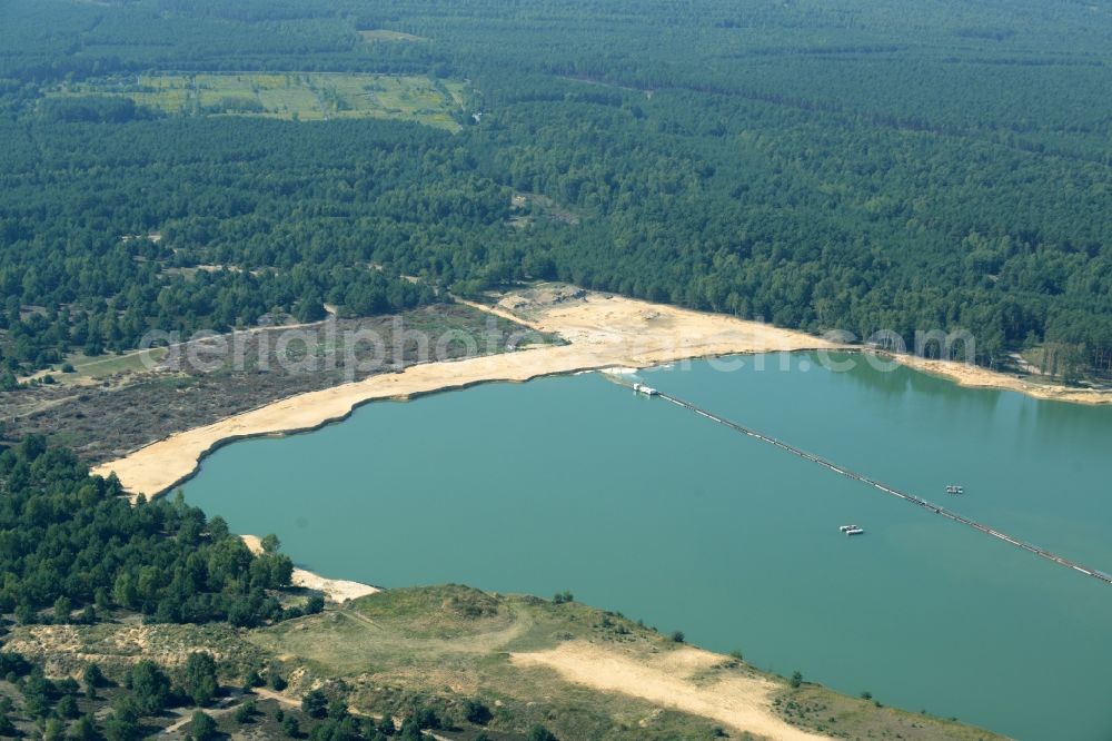 Spreenhagen from above - Site and tailings area of the gravel mining lake in Spreenhagen in the state Brandenburg