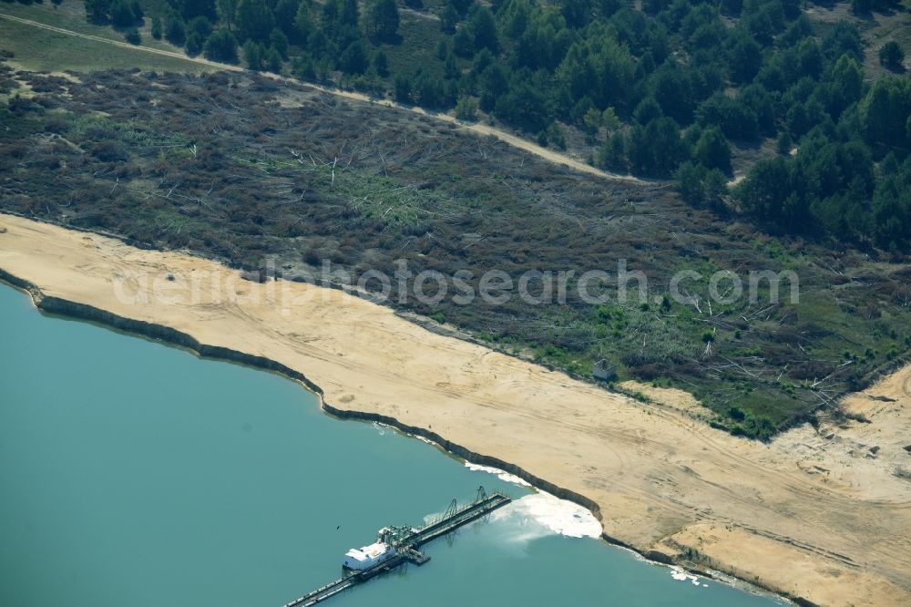 Spreenhagen from above - Site and tailings area of the gravel mining lake in Spreenhagen in the state Brandenburg