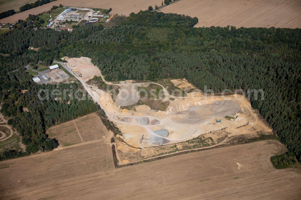 Aerial photograph Vellahn - Site and tailings area of the gravel mining in Vellahn in the state Mecklenburg - Western Pomerania, Germany