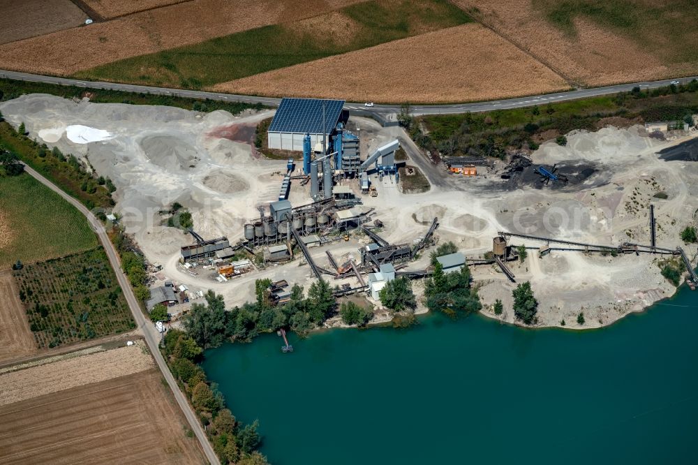 Riegel am Kaiserstuhl from the bird's eye view: Site and tailings area of the gravel mining Vogel Bau in Riegel am Kaiserstuhl in the state Baden-Wurttemberg, Germany