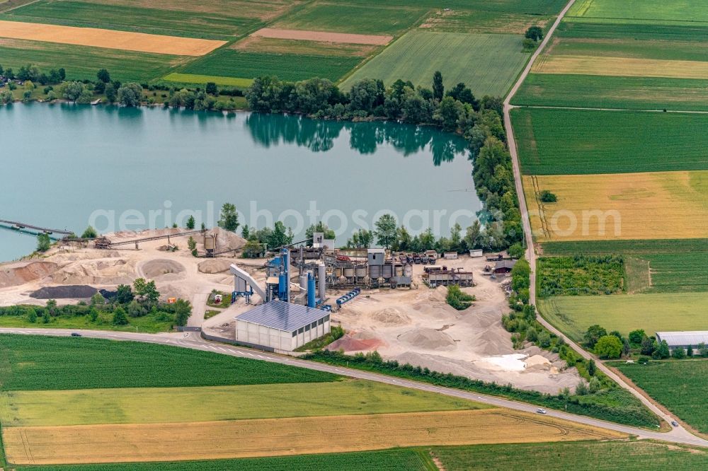 Riegel am Kaiserstuhl from above - Site and tailings area of the gravel mining Vogel Bau in Riegel am Kaiserstuhl in the state Baden-Wurttemberg, Germany