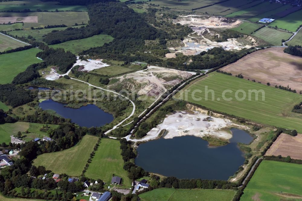 Oeversee from above - Site and tailings area of the gravel minings of the Gonde Clausen Kies- und Betonwerk Oeversee GmbH in Oeversee in the state Schleswig-Holstein