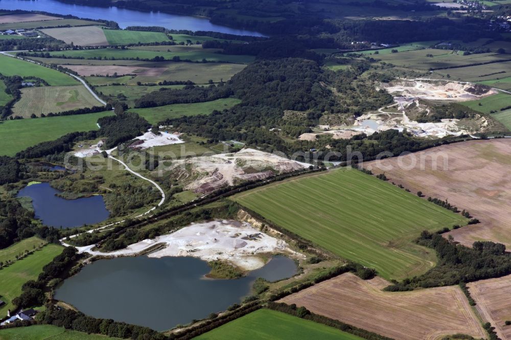 Oeversee from the bird's eye view: Site and tailings area of the gravel minings of the Gonde Clausen Kies- und Betonwerk Oeversee GmbH in Oeversee in the state Schleswig-Holstein