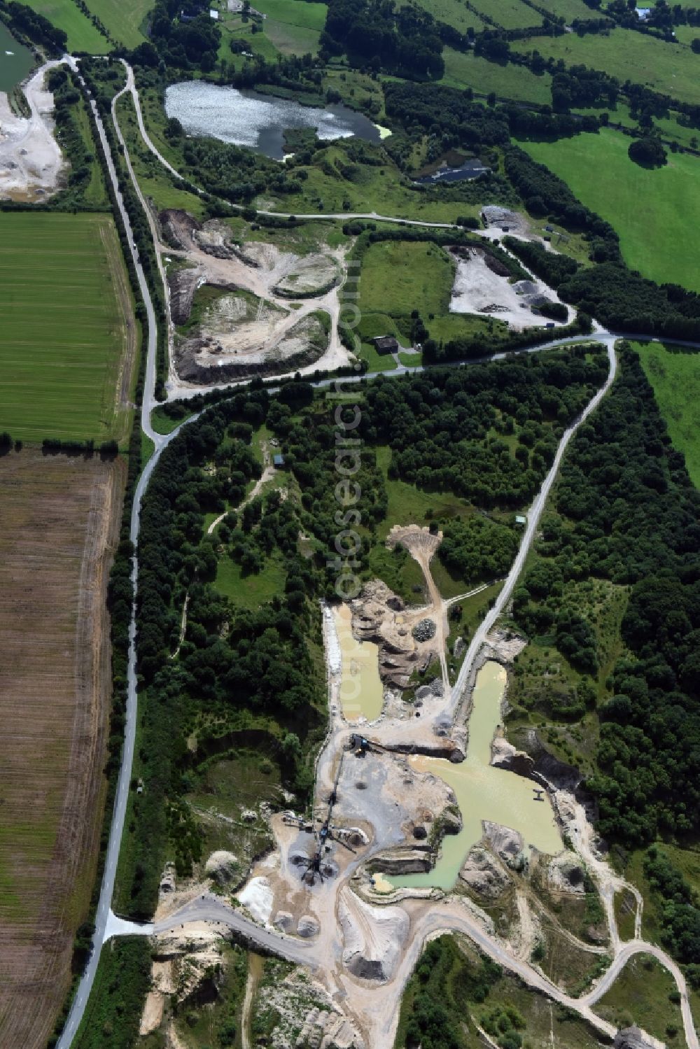 Aerial image Oeversee - Site and tailings area of the gravel minings of the Gonde Clausen Kies- und Betonwerk Oeversee GmbH in Oeversee in the state Schleswig-Holstein