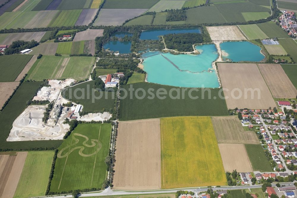 Pliening from the bird's eye view: Site and tailings area of the gravel mining in Pliening in the state Bavaria, Germany