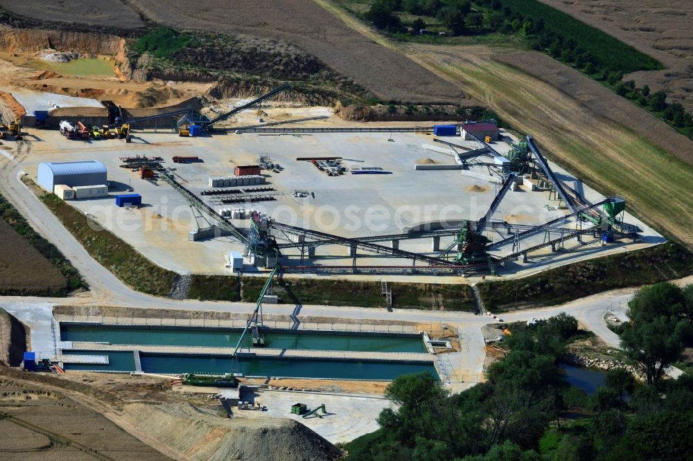 Schkölen from above - View of the gravel plant of Wagner Kieswerke GmbH on a field near Schkoelen in the state Thuringia