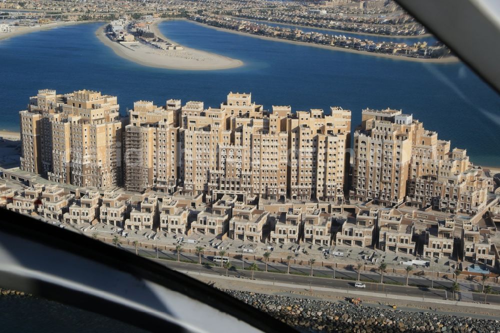 Dubai from above - Kingdom of Sheba and Balqis Residences on the crescent of the Palm Jumeirah island in Dubai in United Arab Emirates