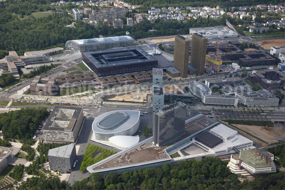 Luxembourg Luxemburg from the bird's eye view: Kirchberg plateau with the buildings of the European Court of Justice, ECJ, in the background. In front, on both sides of Avenue John. F. Kennedy, two office towers, the Porte de L'Europe and the Philharmonie