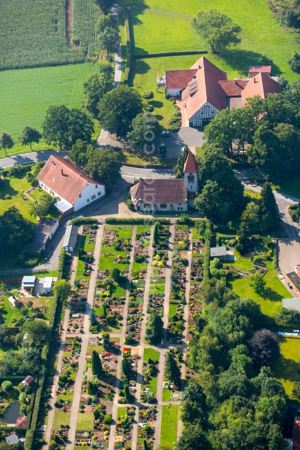 Aerial image Bieren - Church and grave rows on the grounds of the cemetery in Bieren in the state North Rhine-Westphalia