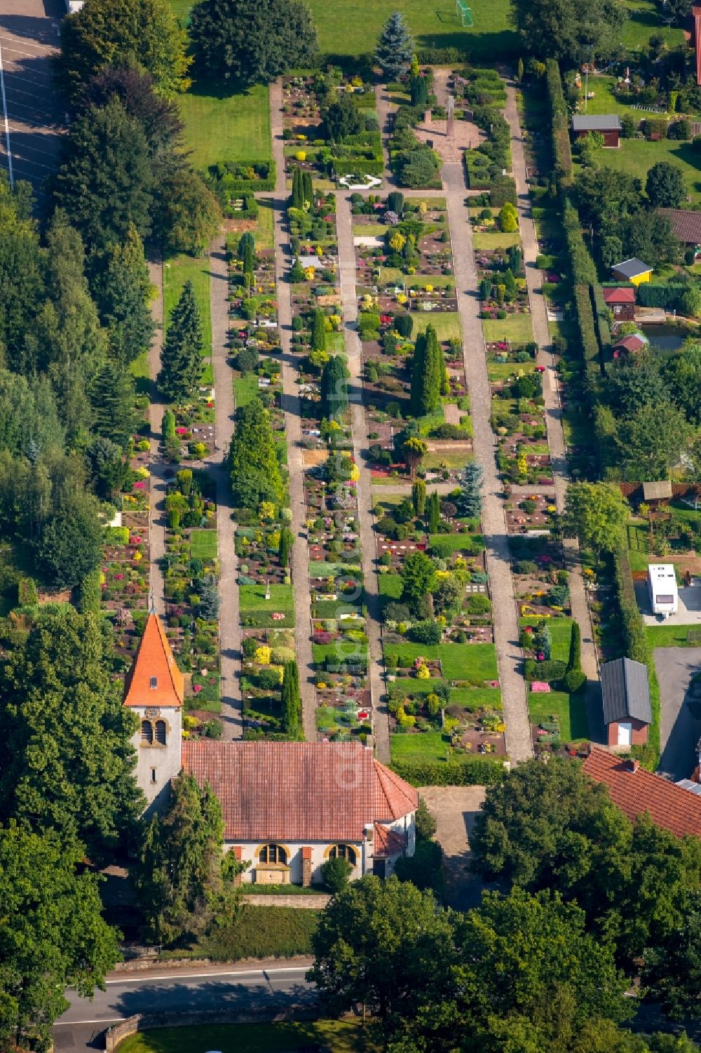 Aerial photograph Bieren - Church and grave rows on the grounds of the cemetery in Bieren in the state North Rhine-Westphalia